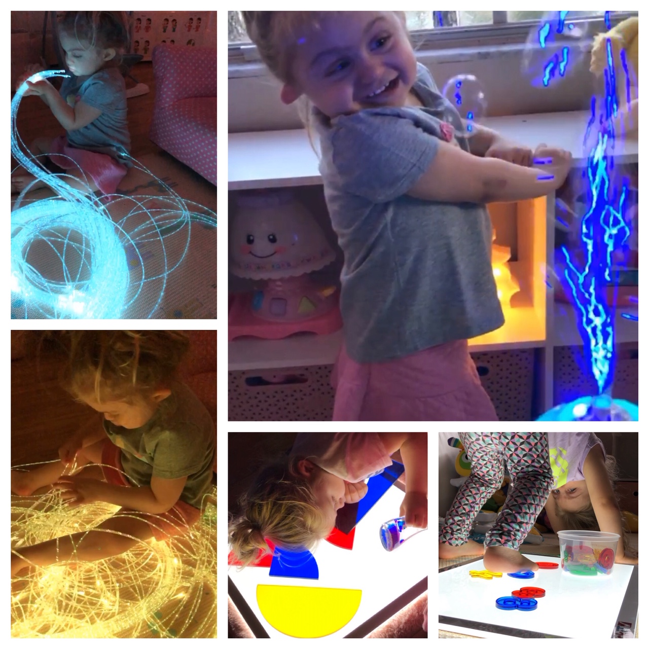 A girl plays with light strings and toys.